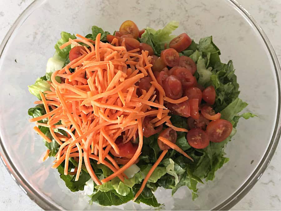 Chicken Caesar Salad Wrap filling in a glass bowl