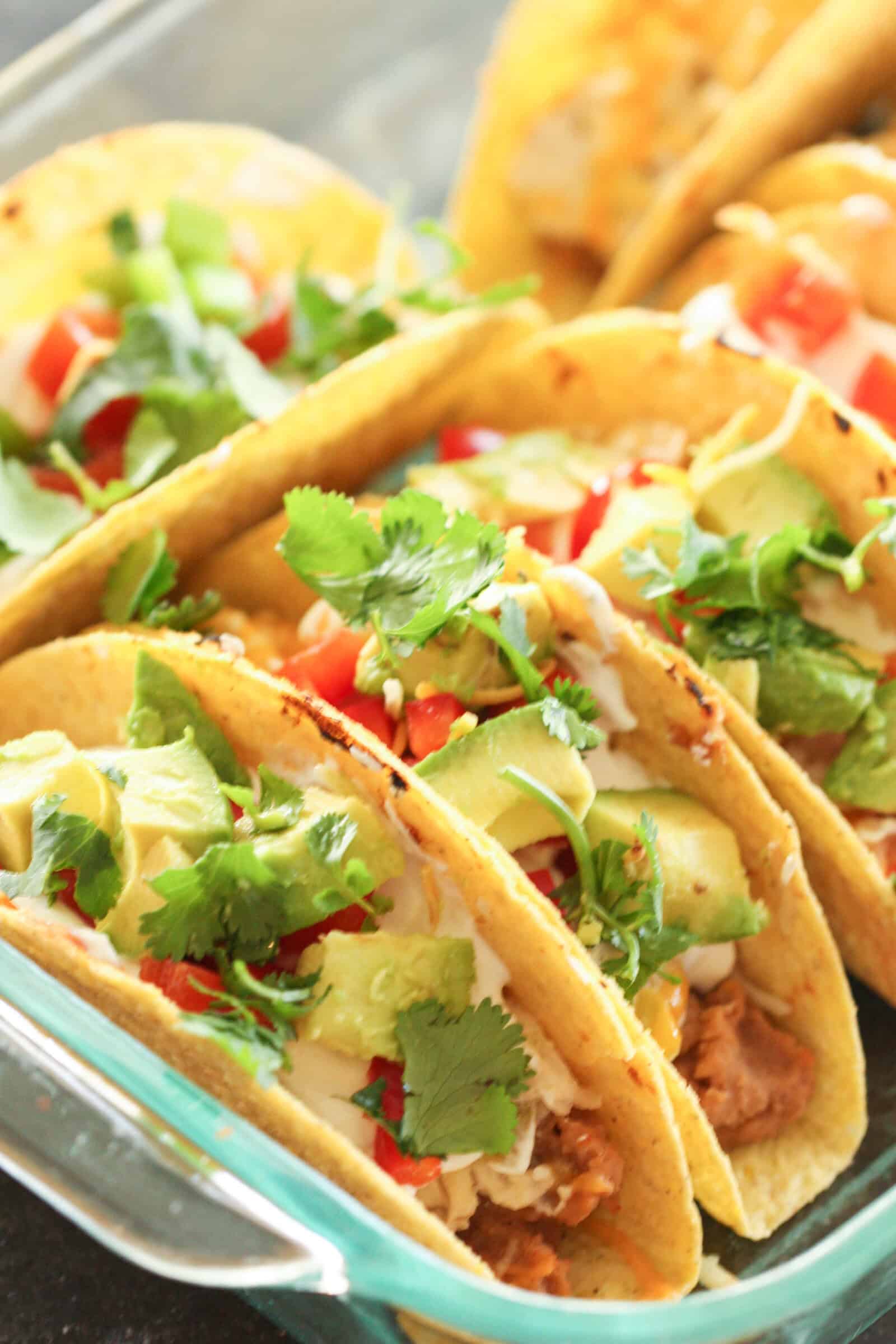 20 Minute 7 Layer Chicken Tacos in a casserole dish