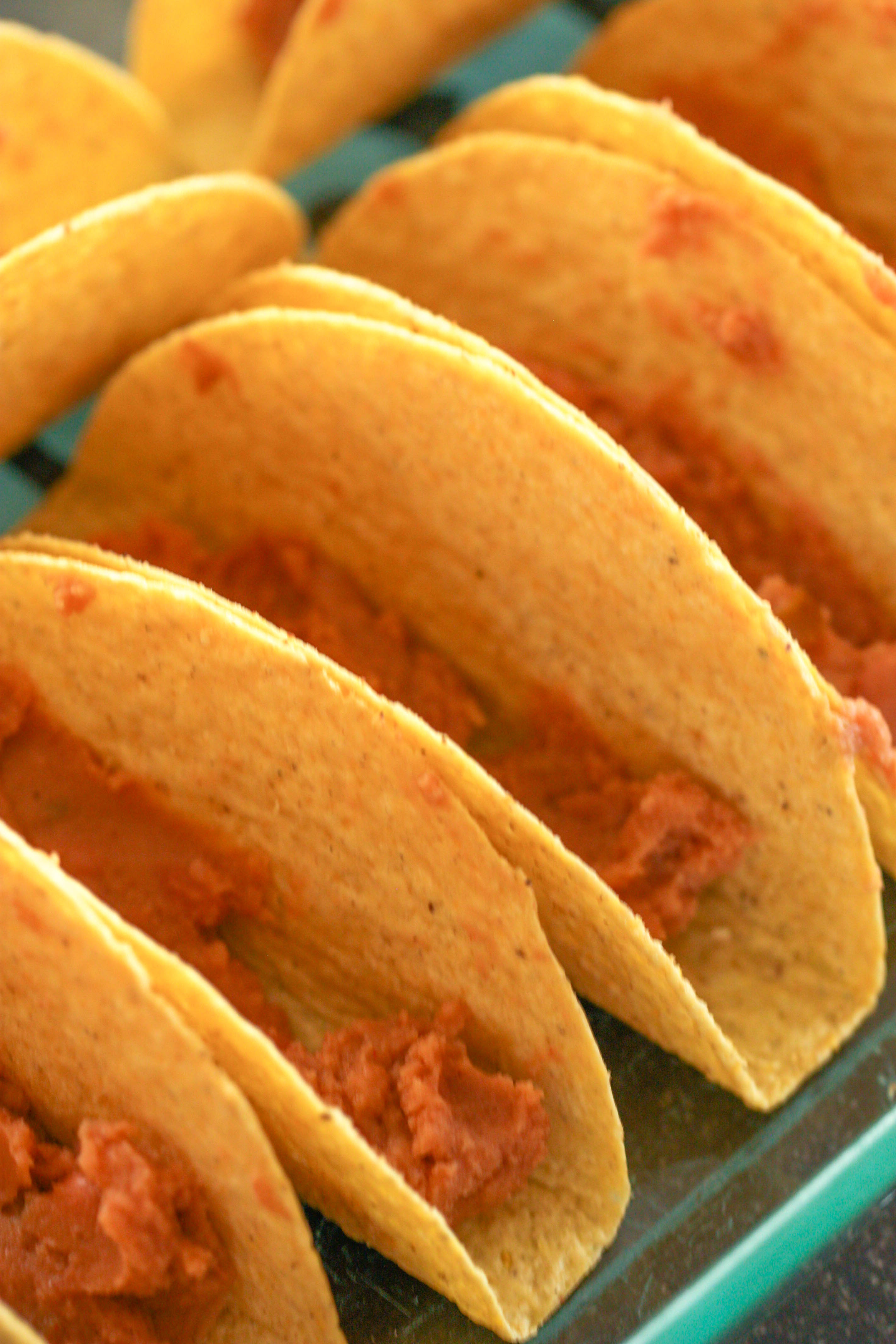 Refried beans in hard taco shells