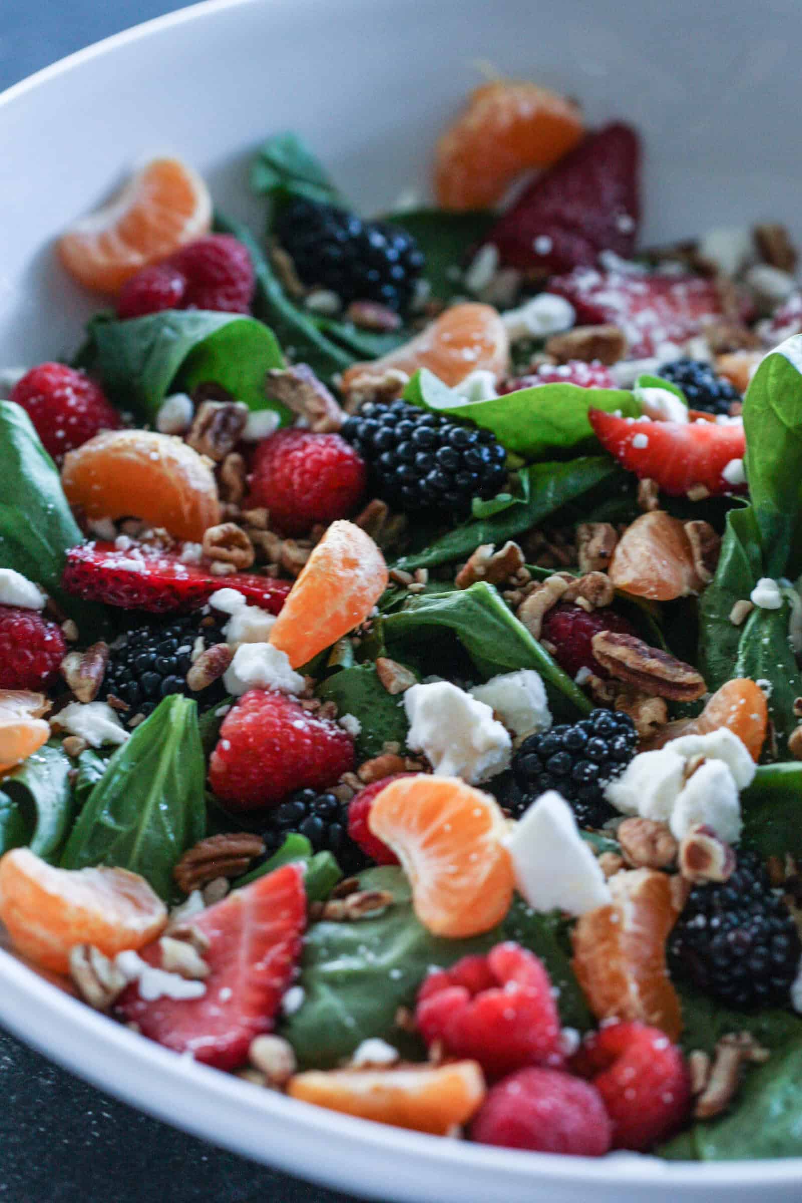 Citrus Berry Salad with toppings in a bowl