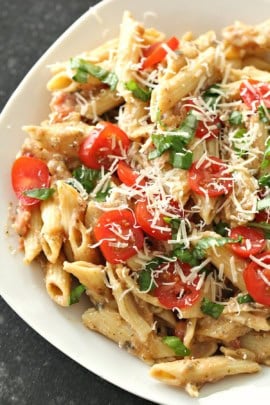 A plate of Slow Cooker Alfredo Pesto Chicken and Pasta