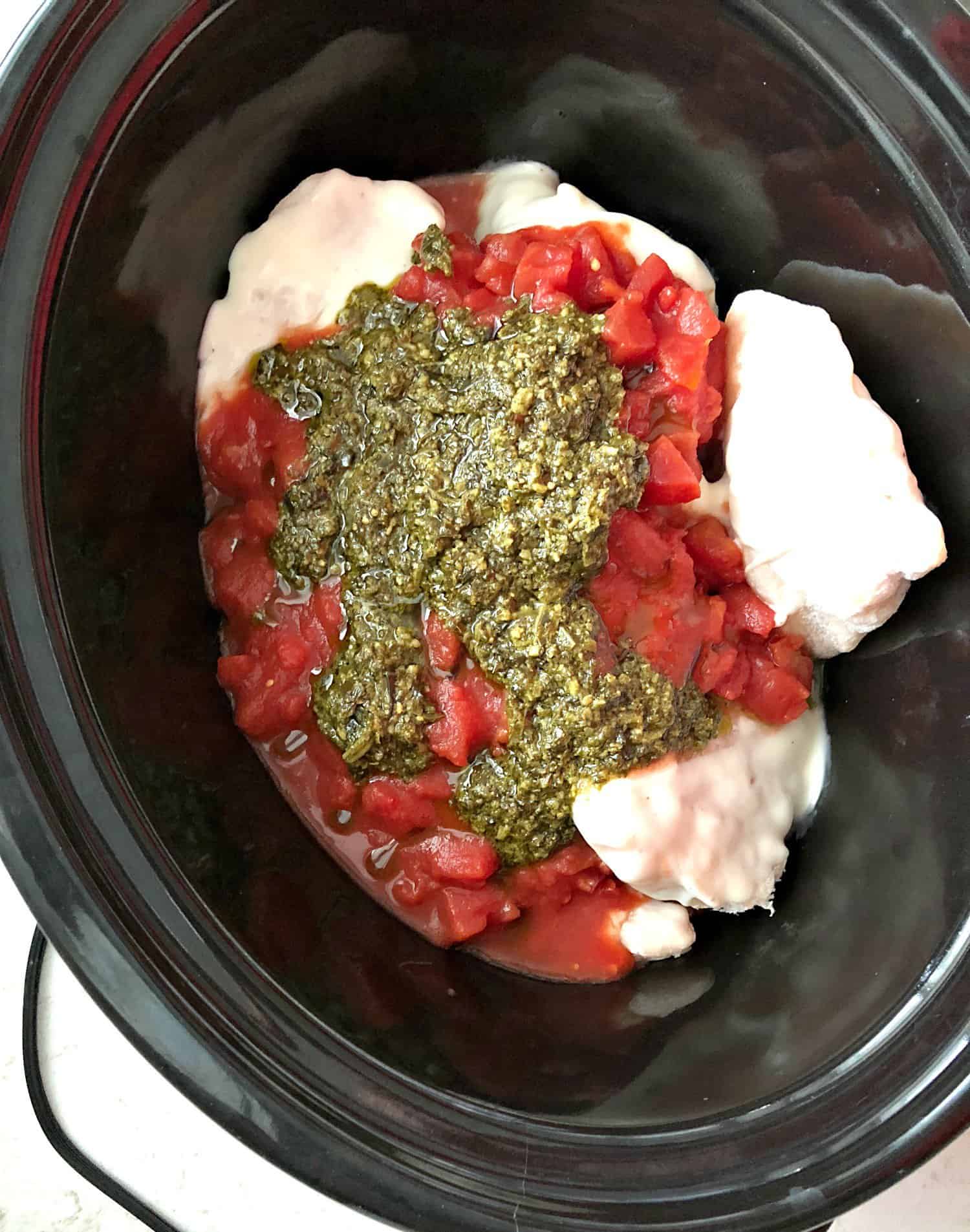 Chicken tomatoes and pesto in slow cooker