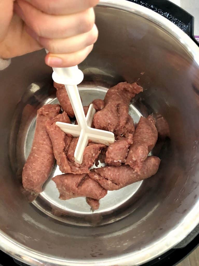Sausage in instant pot using a chopstir.