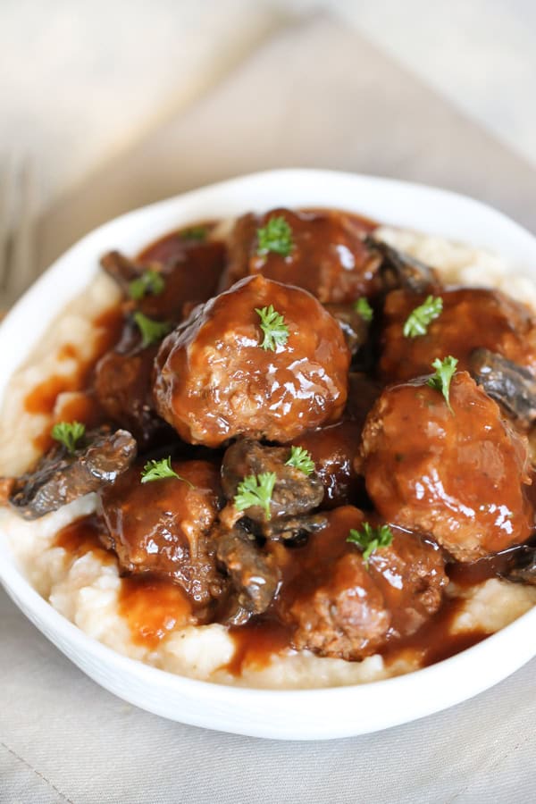 Salisbury Steak Meatballs served over rice in a white bowl