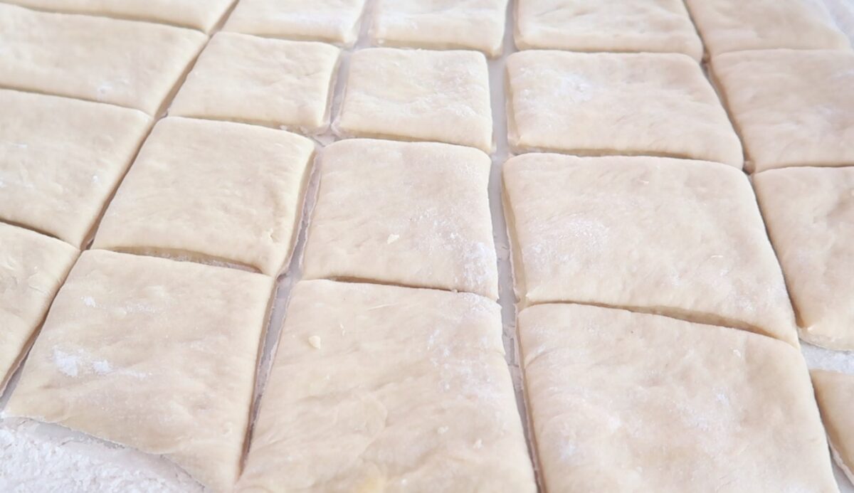 Roll dough cut into squares.