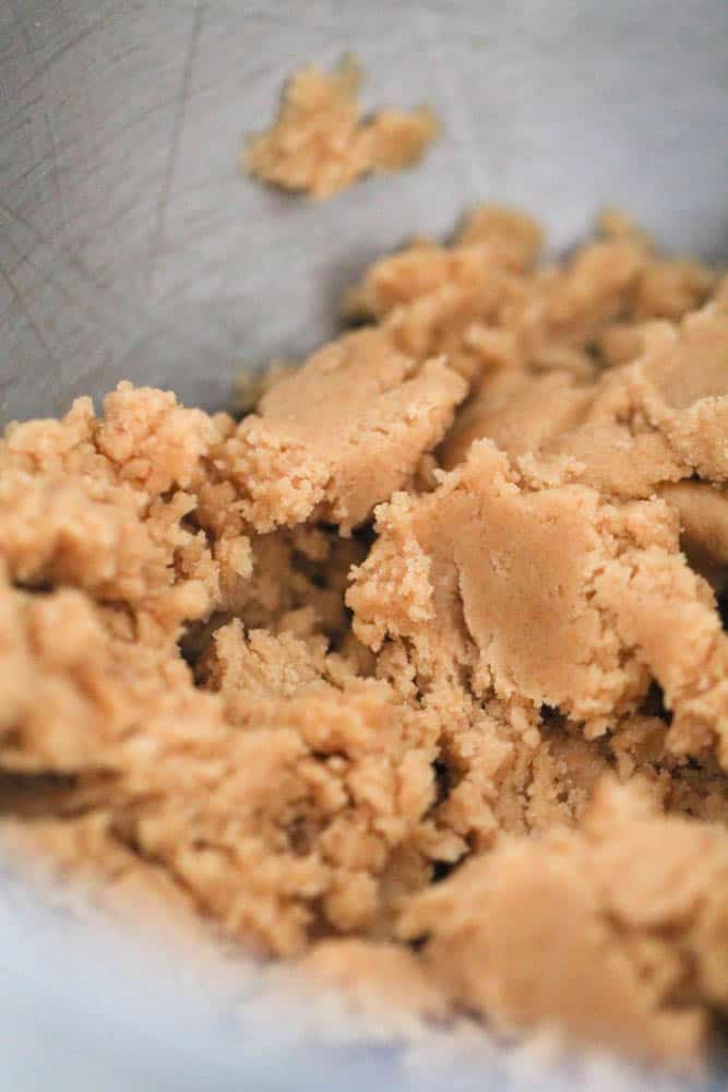 Peanut Butter Cookie Dough in a metal mixing bowl.