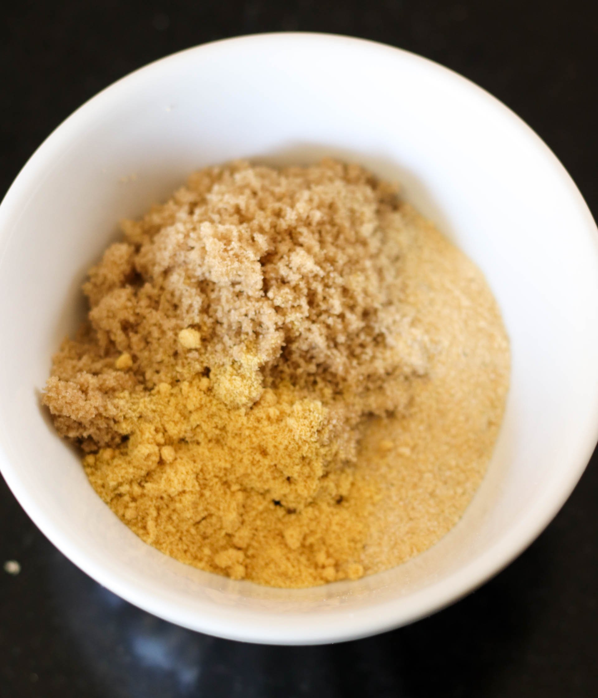 Brown sugar mixture in a white bowl for sticky asian ribs