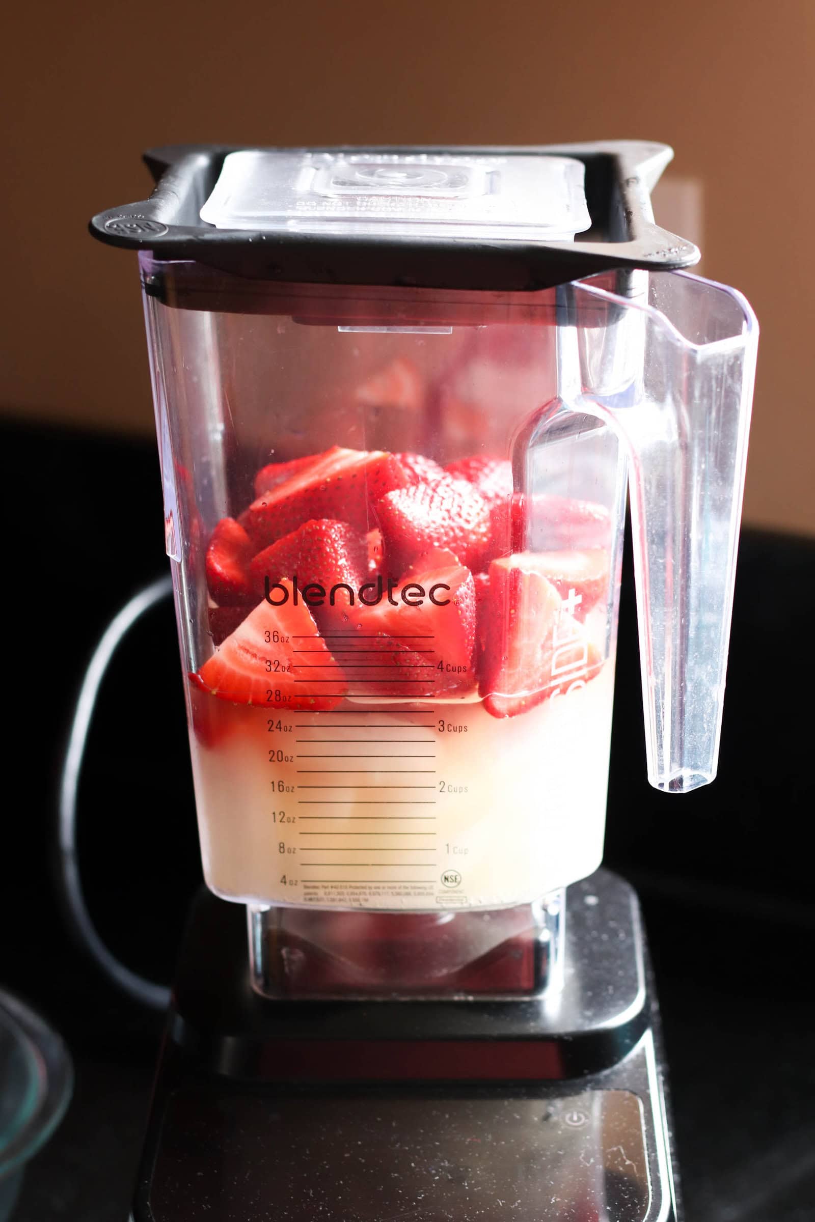 Blender with ingredients for Copycat Lemonberry Slush