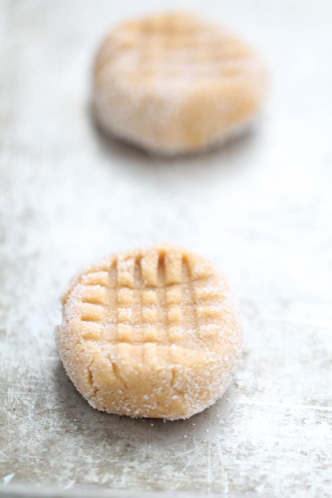 Unbaked Perfect Peanut Butter Cookie on a baking sheet