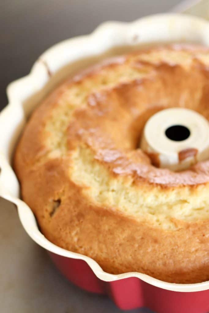 White Chocolate Raspberry Bundt Cake in a bundt cake pan.
