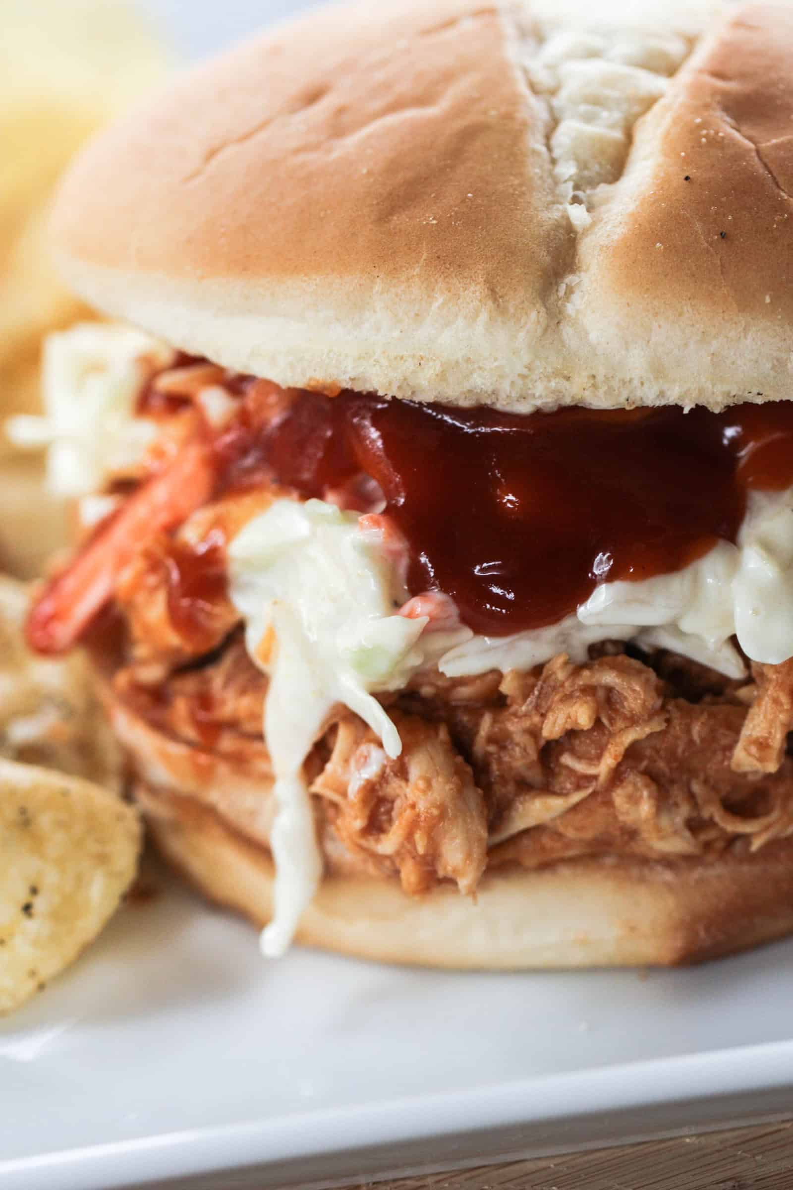 Hawaiian Chicken Sandwiches on a plate with chips
