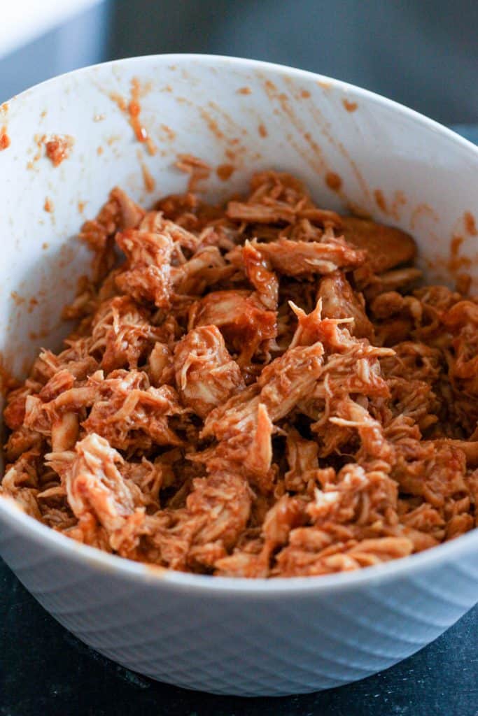 Shredded BBQ chicken in a bowl.