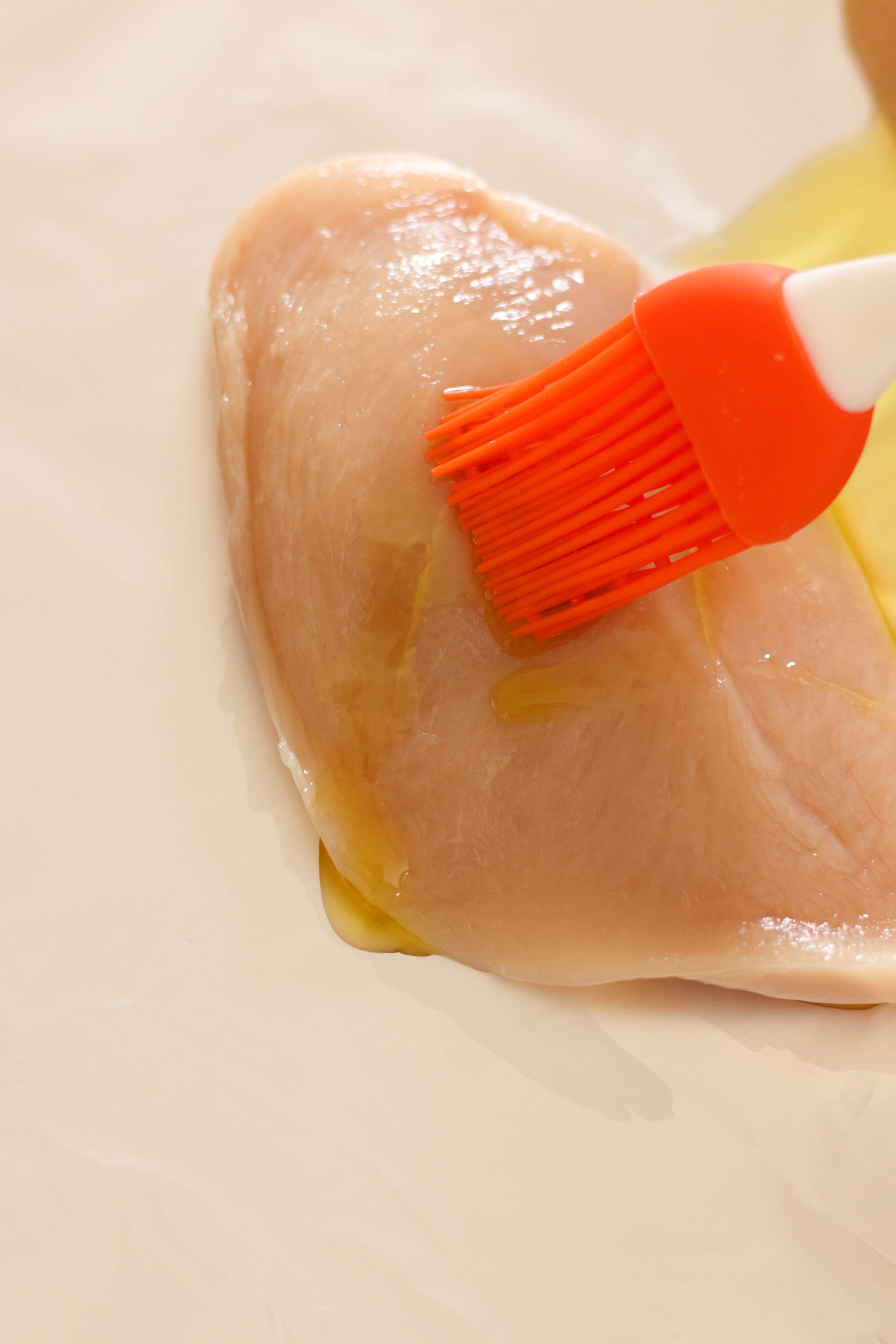 Brush oil on Chicken Breast