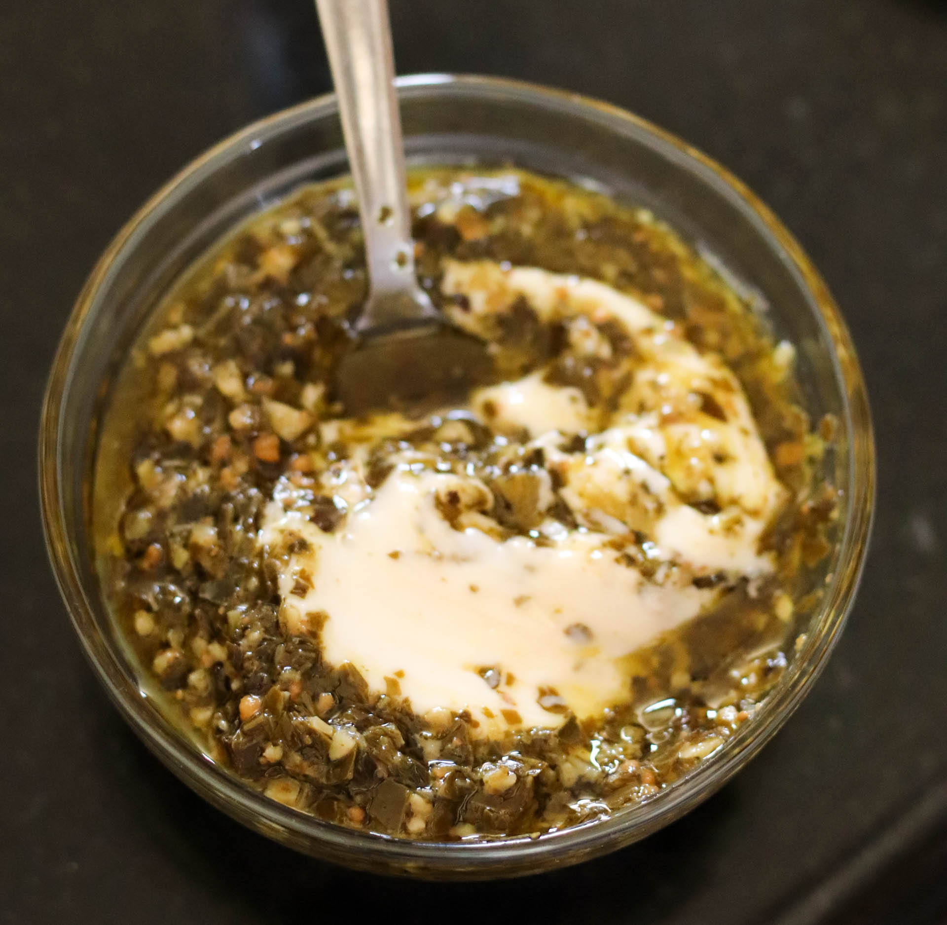 Pesto mixture in small glass bowl