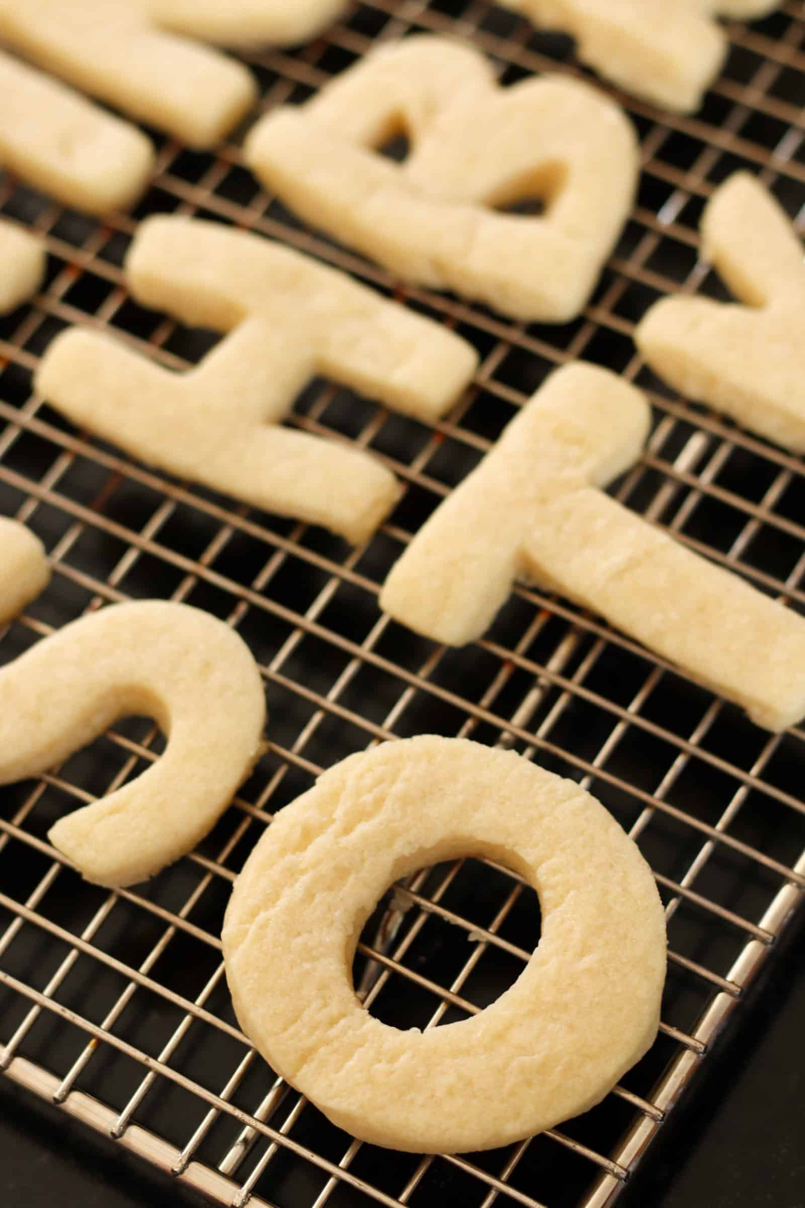 Back-to-School Alphabet Sugar Cookies cooling on cooling rack