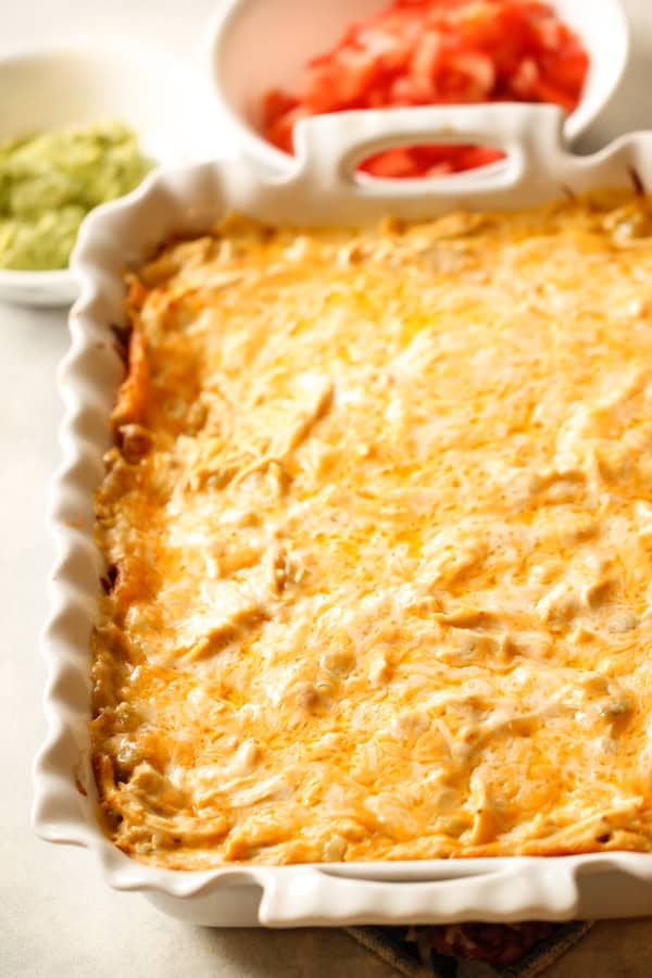 Baked Chicken Enchilada Casserole in casserole dish