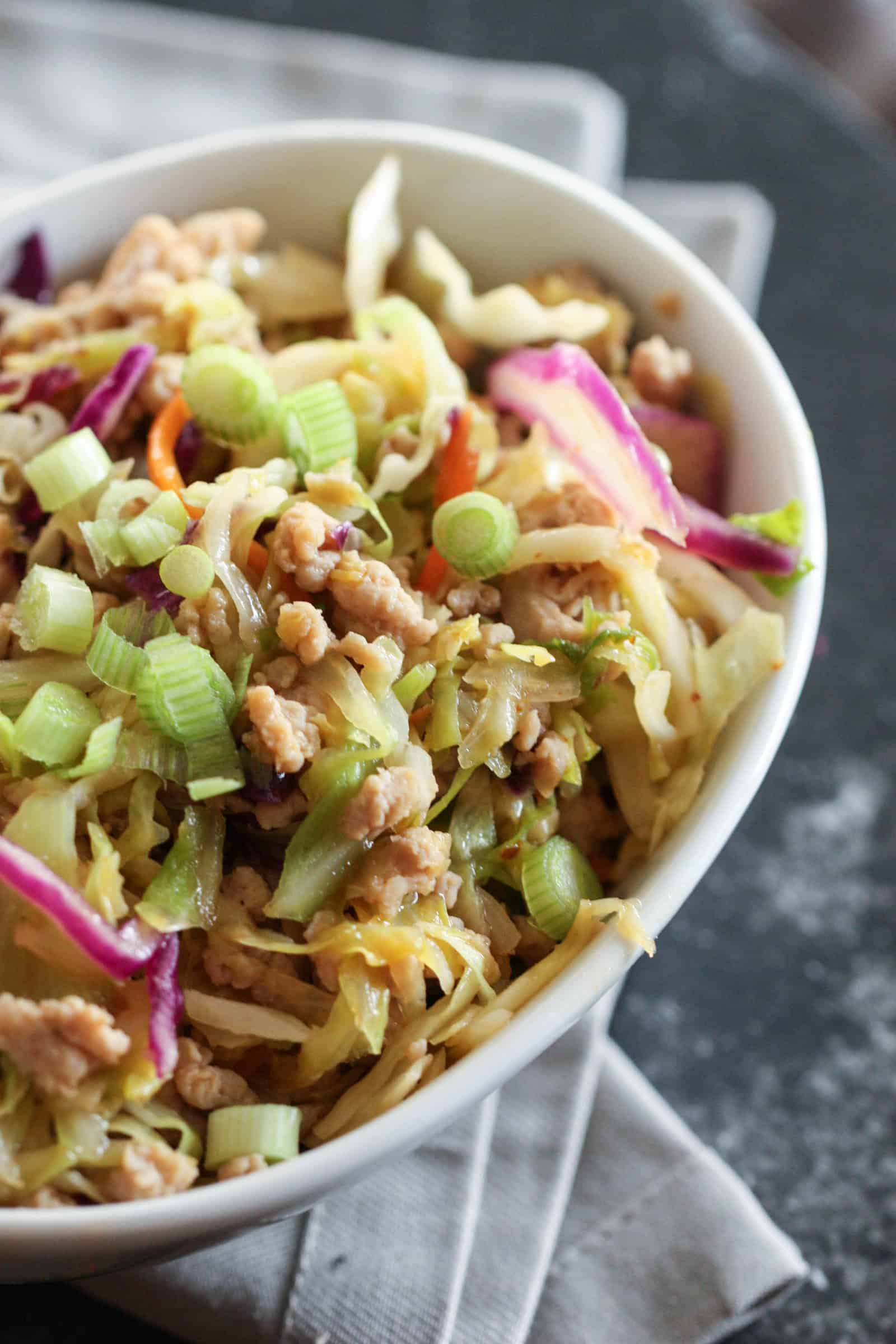 Close up of Egg Roll in a bowl, in a white bowl