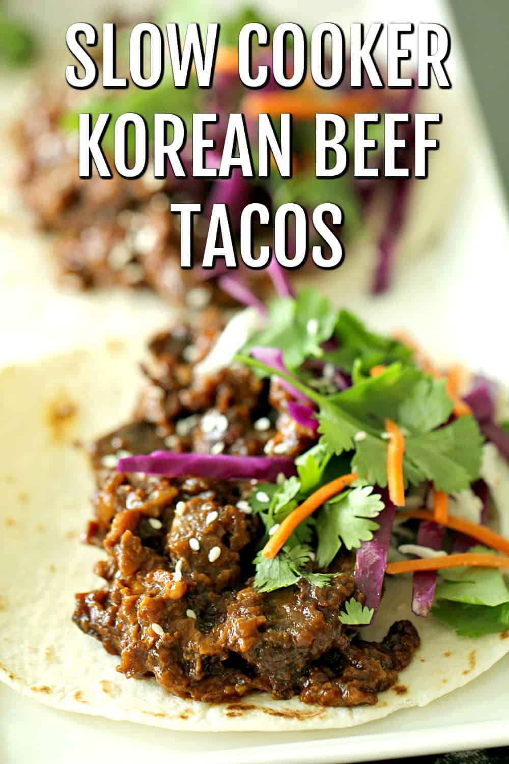 Slow Cooker Korean Beef in tacos with toppings