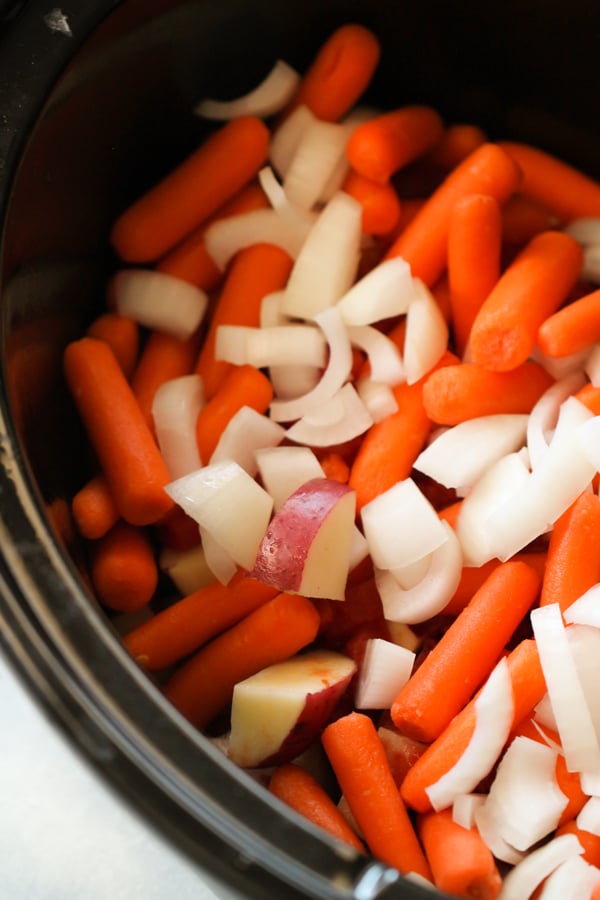 Carrots, onions and potatoes in slow cooker