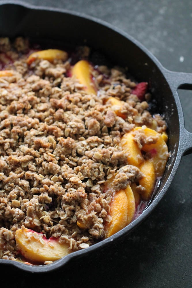 Peach and Berry Crisp in a skillet