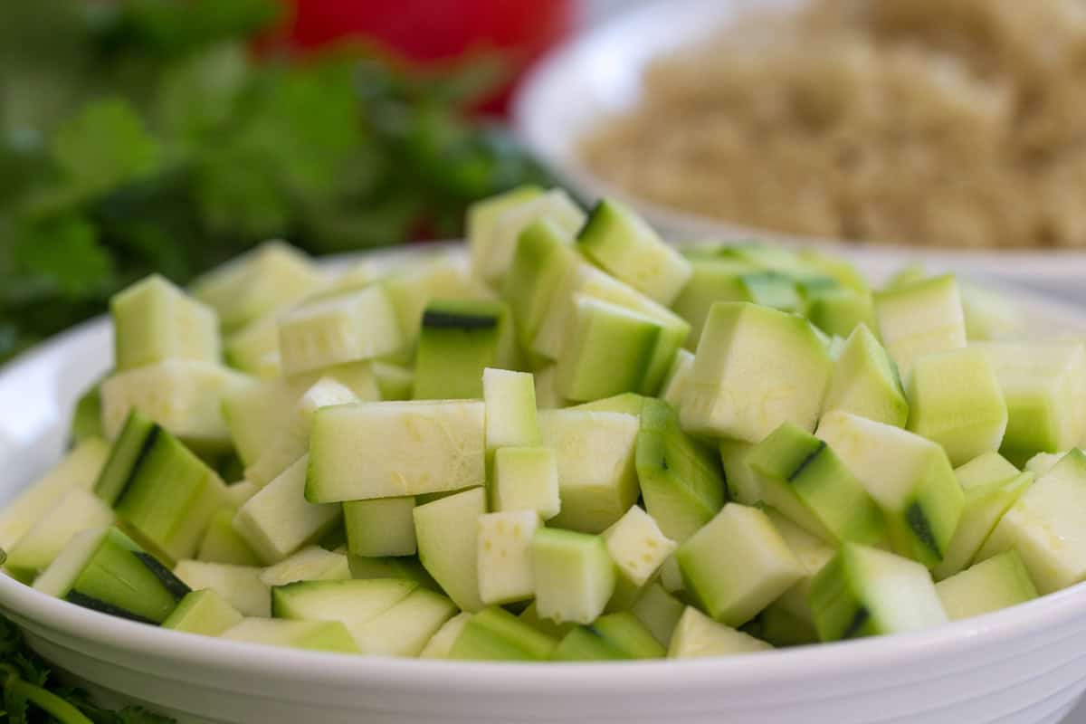 Cubed Zucchini in a white bowl