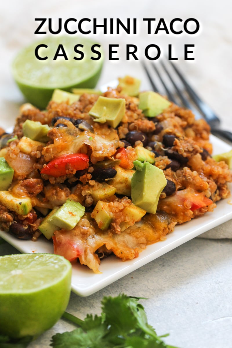 Zucchini Taco Casserole on a white plate topped with avocado