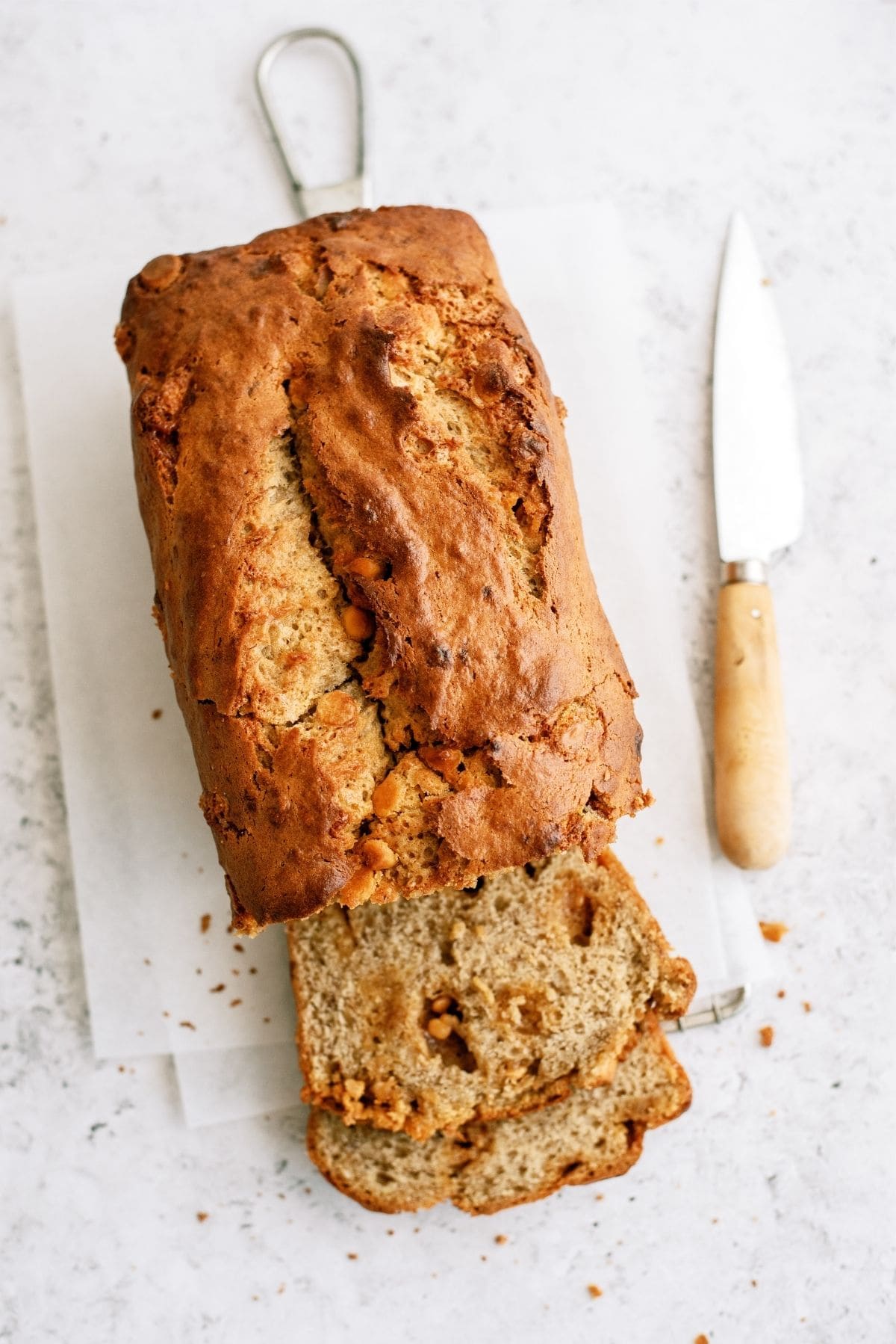 Butterscotch Banana Bread sliced on a cutting board