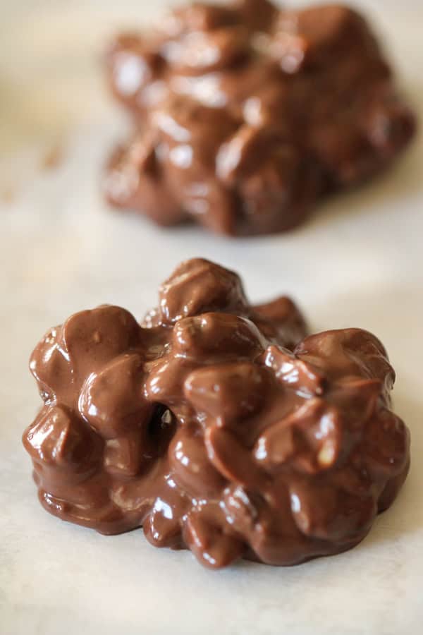 Gooey Copycat Chunky Clusters cooling on parchment paper