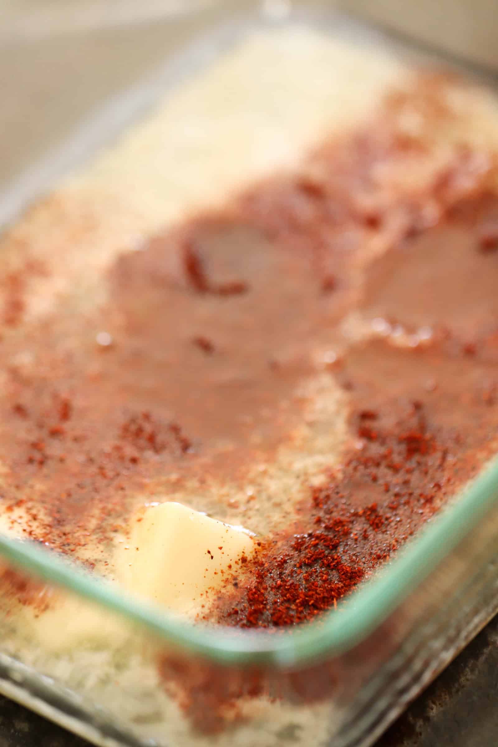 melted butter, chili powder and lime juice in baking dish