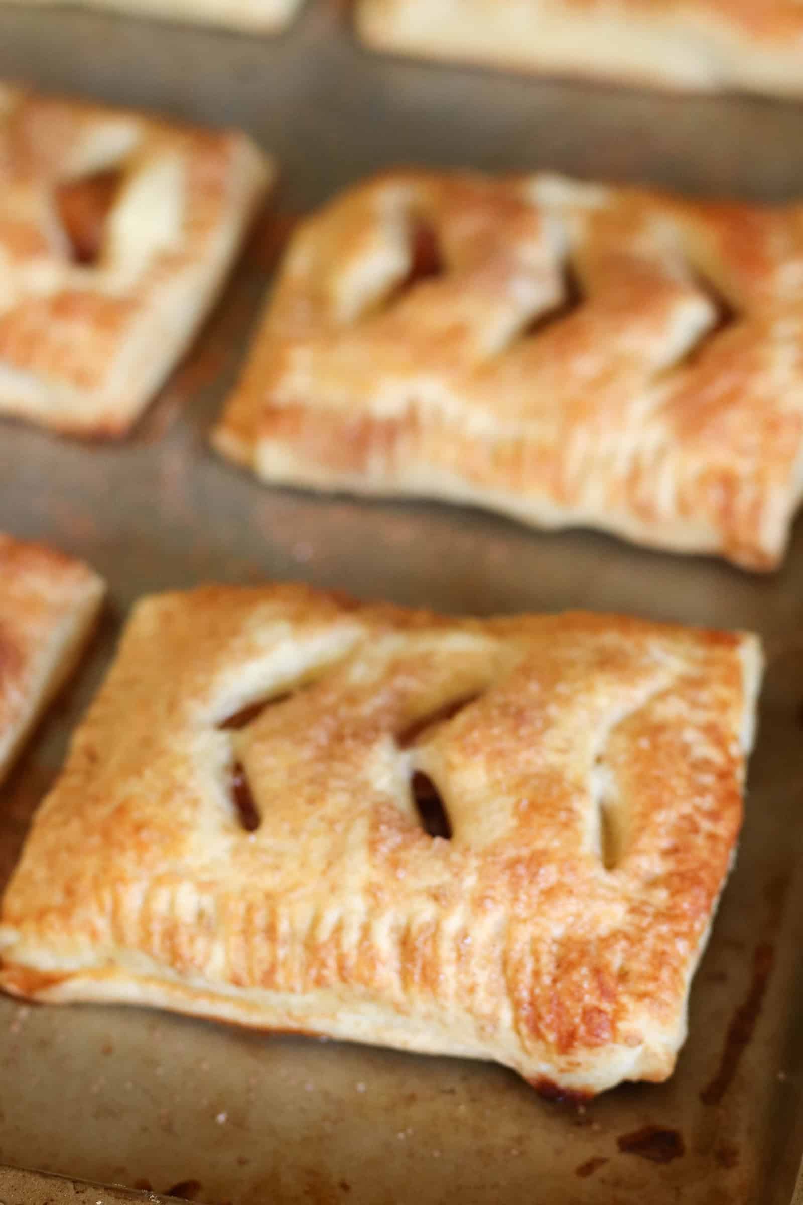 Baked Peach Hand Pies on baking sheet