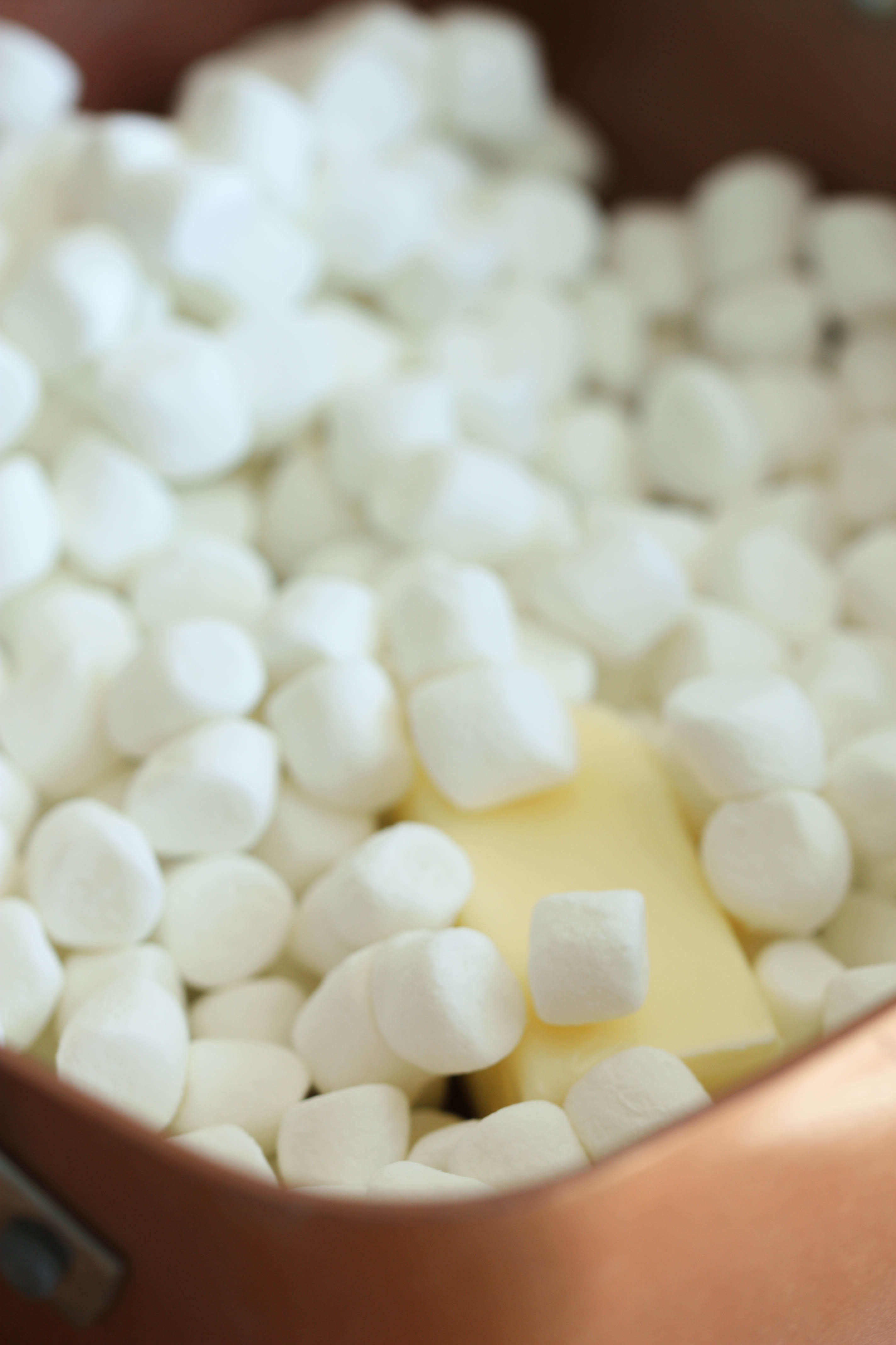 Marshmallows and butter in a pan