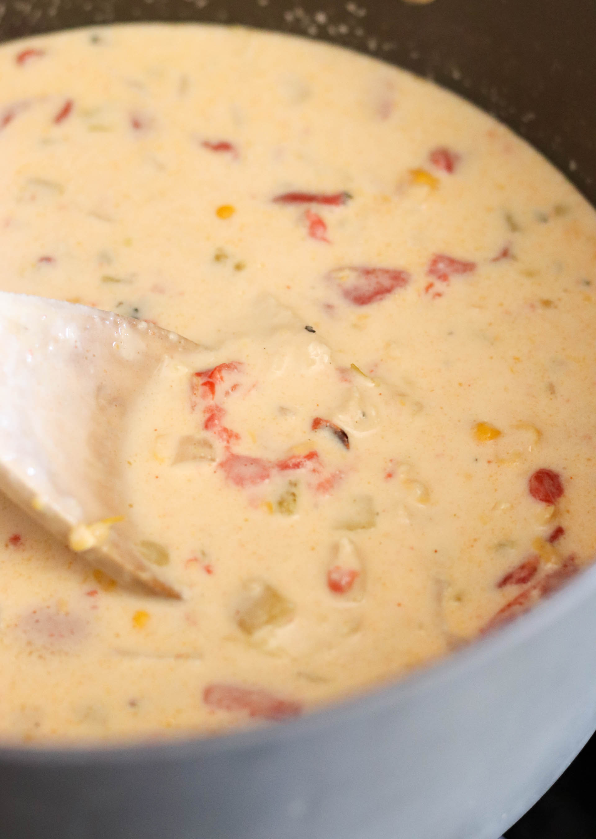 Cheese, chicken, corn, half and half, added to soup and mixed together