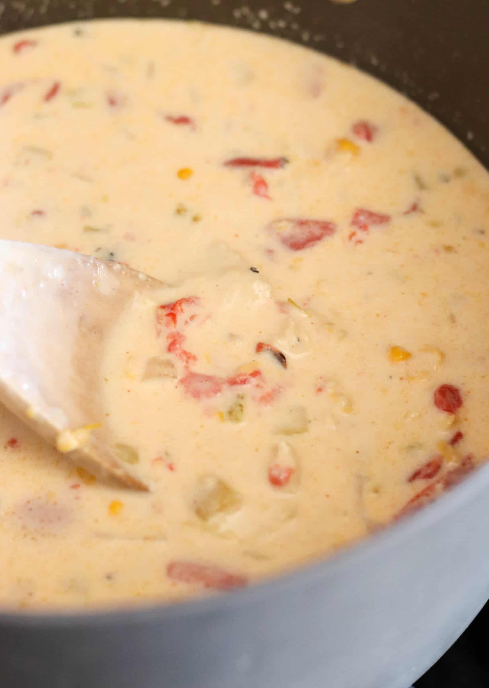 Cheese, chicken, corn, half and half, added to soup and mixed together