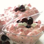 Fluffy cranberry salad in bowls