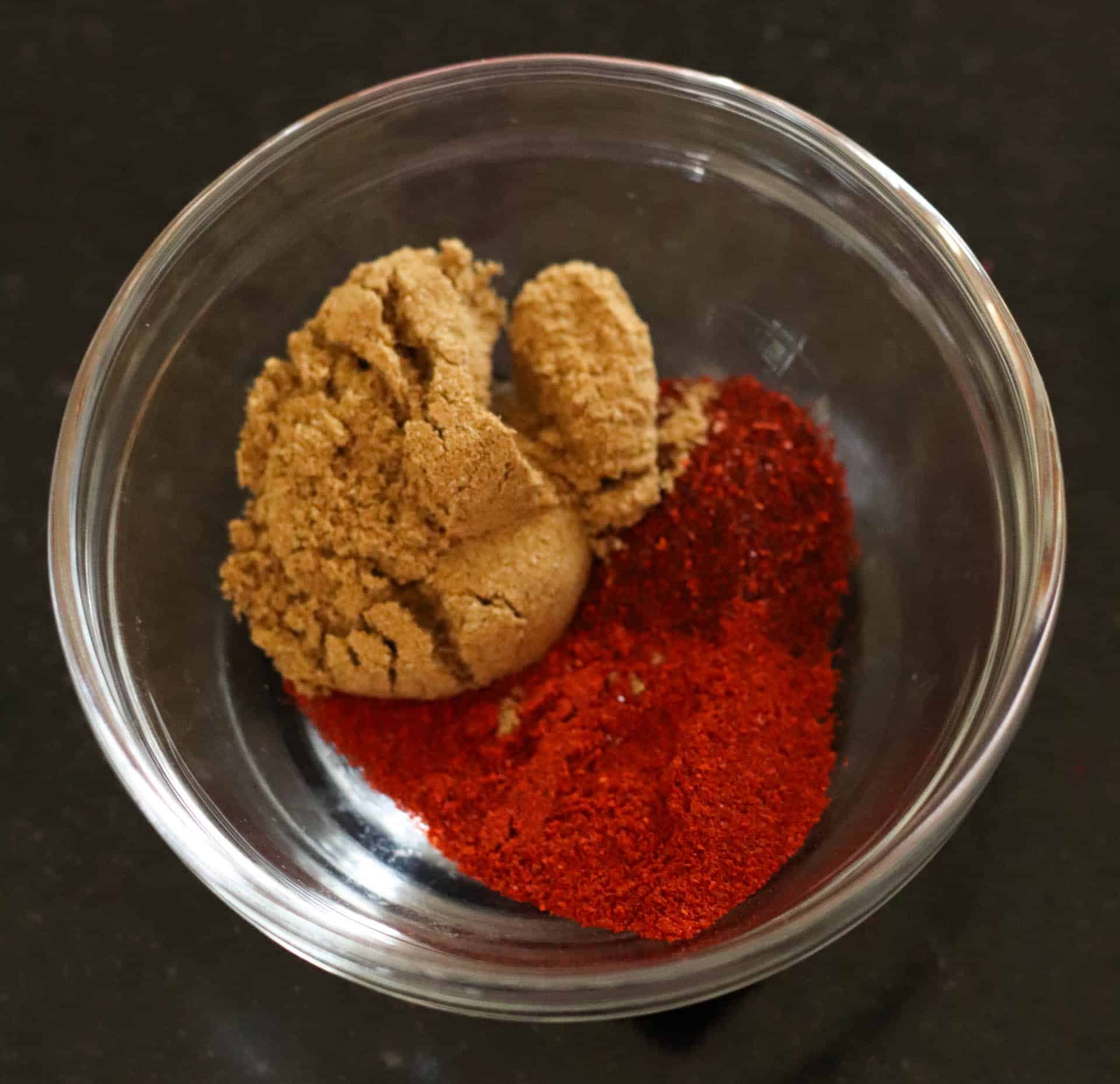 Seasoning for pork carnitas in a bowl