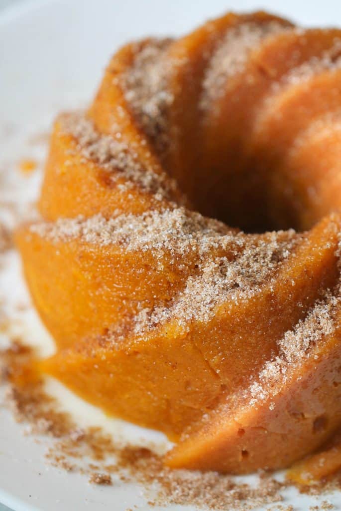 close up of pumpkin snickerdoodle bread topped with cinnamon and sugar