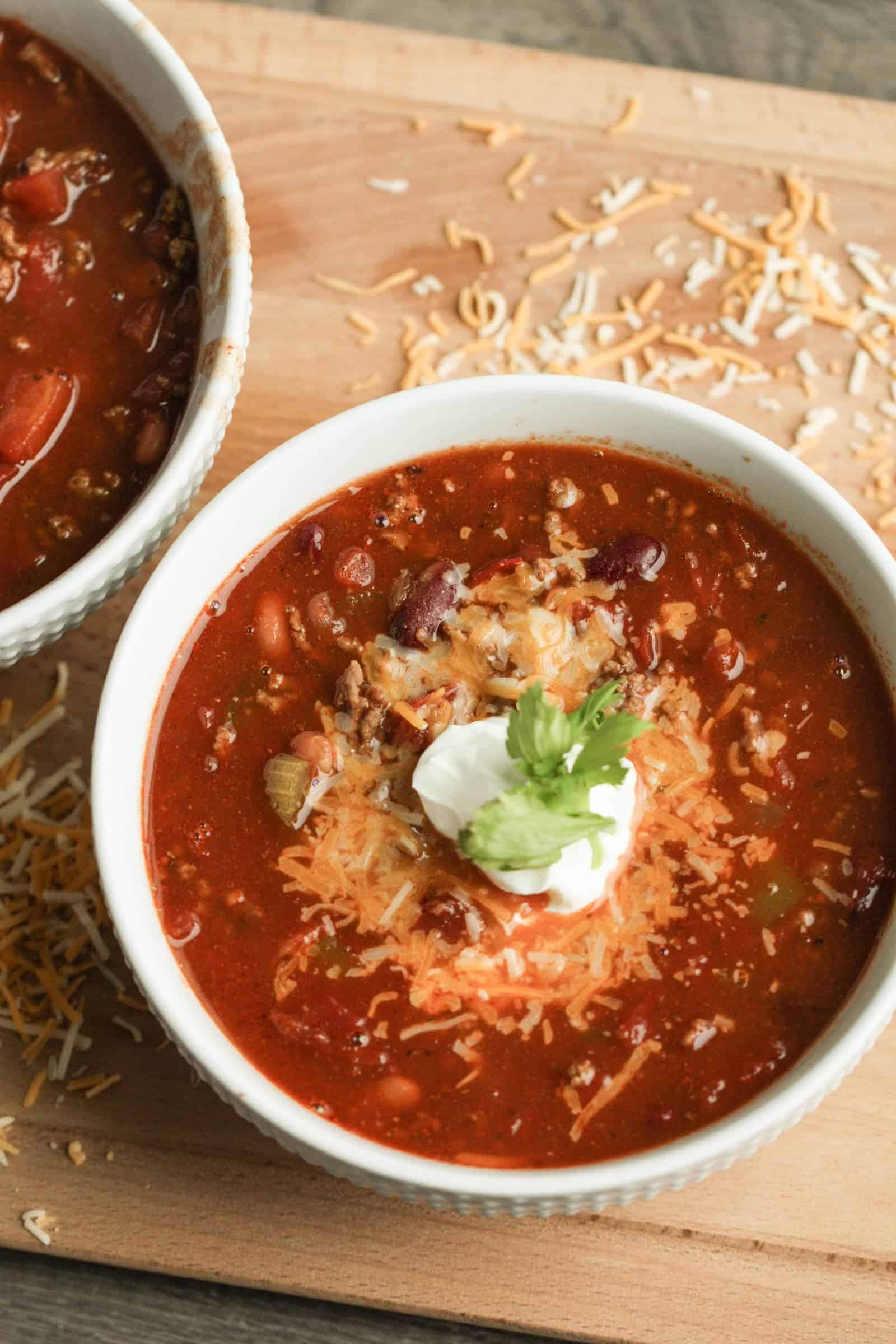 Wendy’s Copycat Chili in a bowl with sour cream and cheese