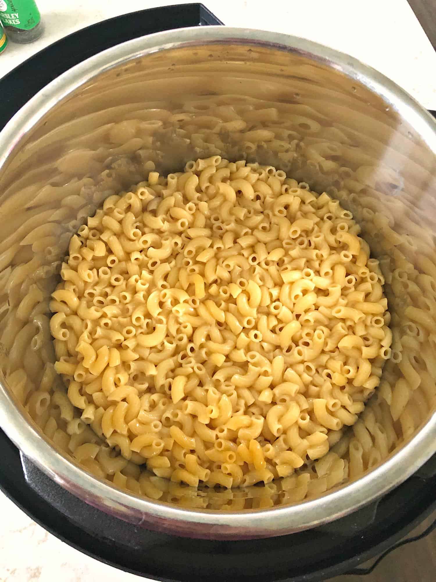 Cooked pasta in bottom of instant pot