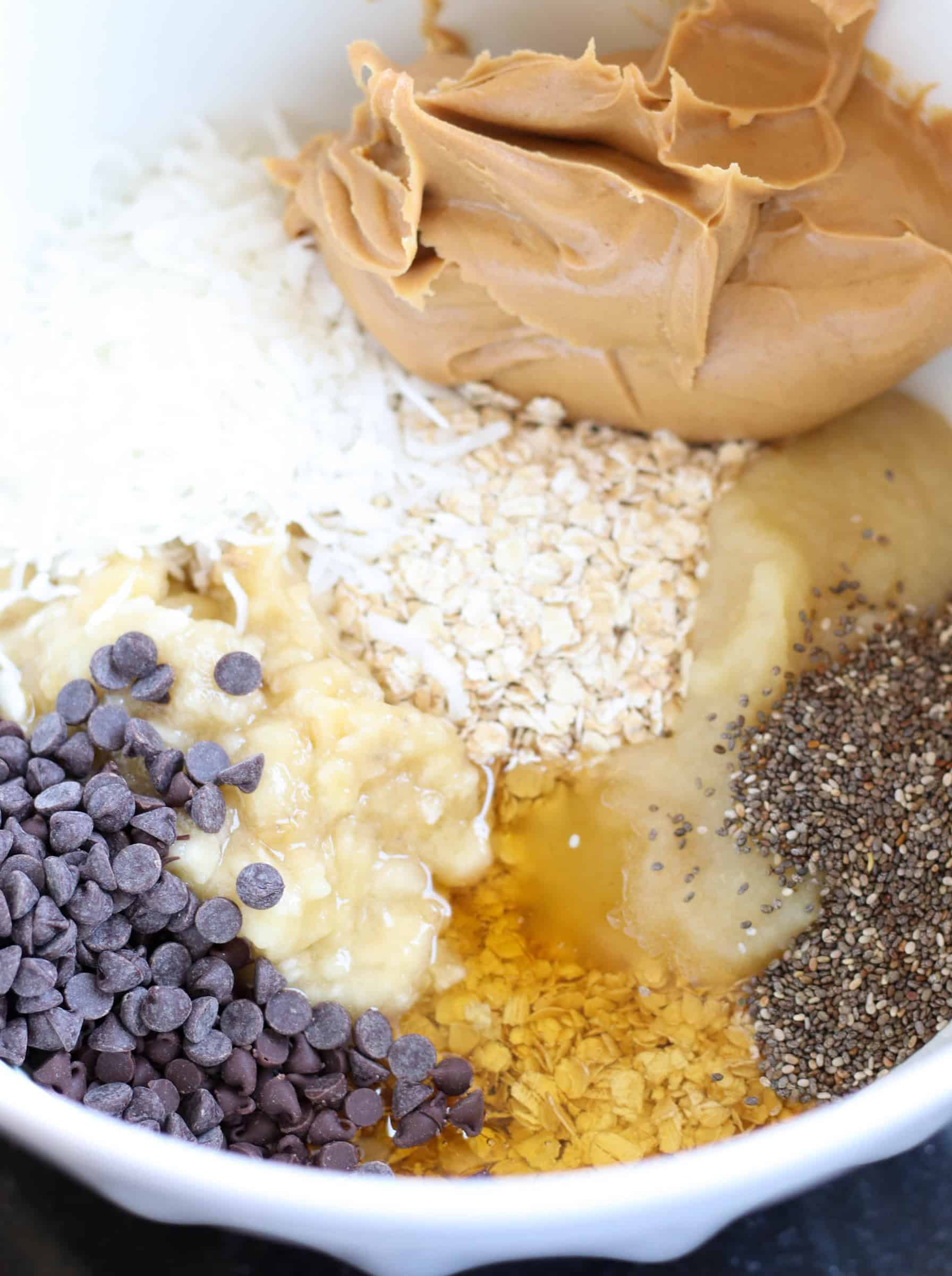 Ingredients for Breakfast Cookies in a white mixing bowl