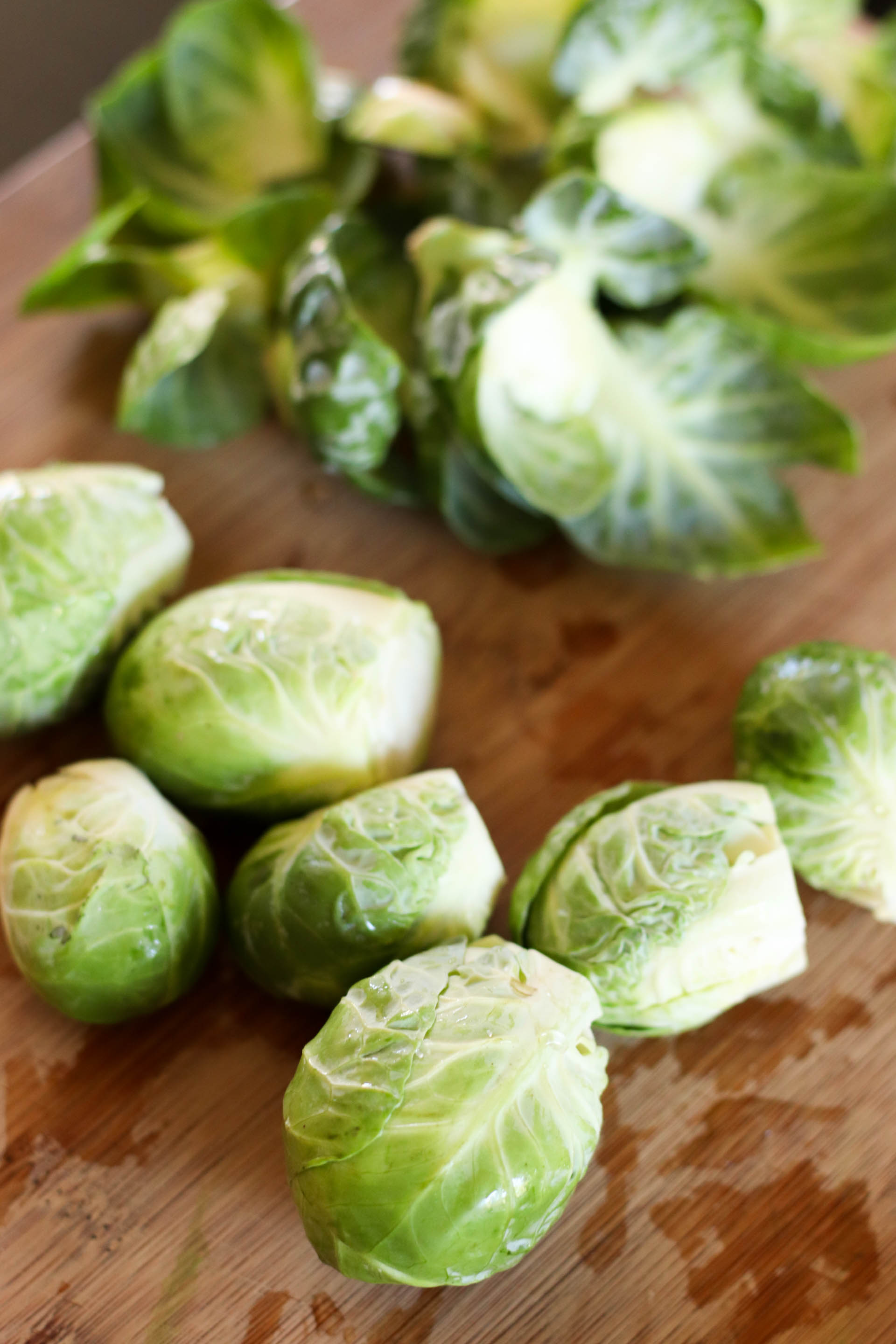 Fresh Brussel Sprouts washed on a cutting board
