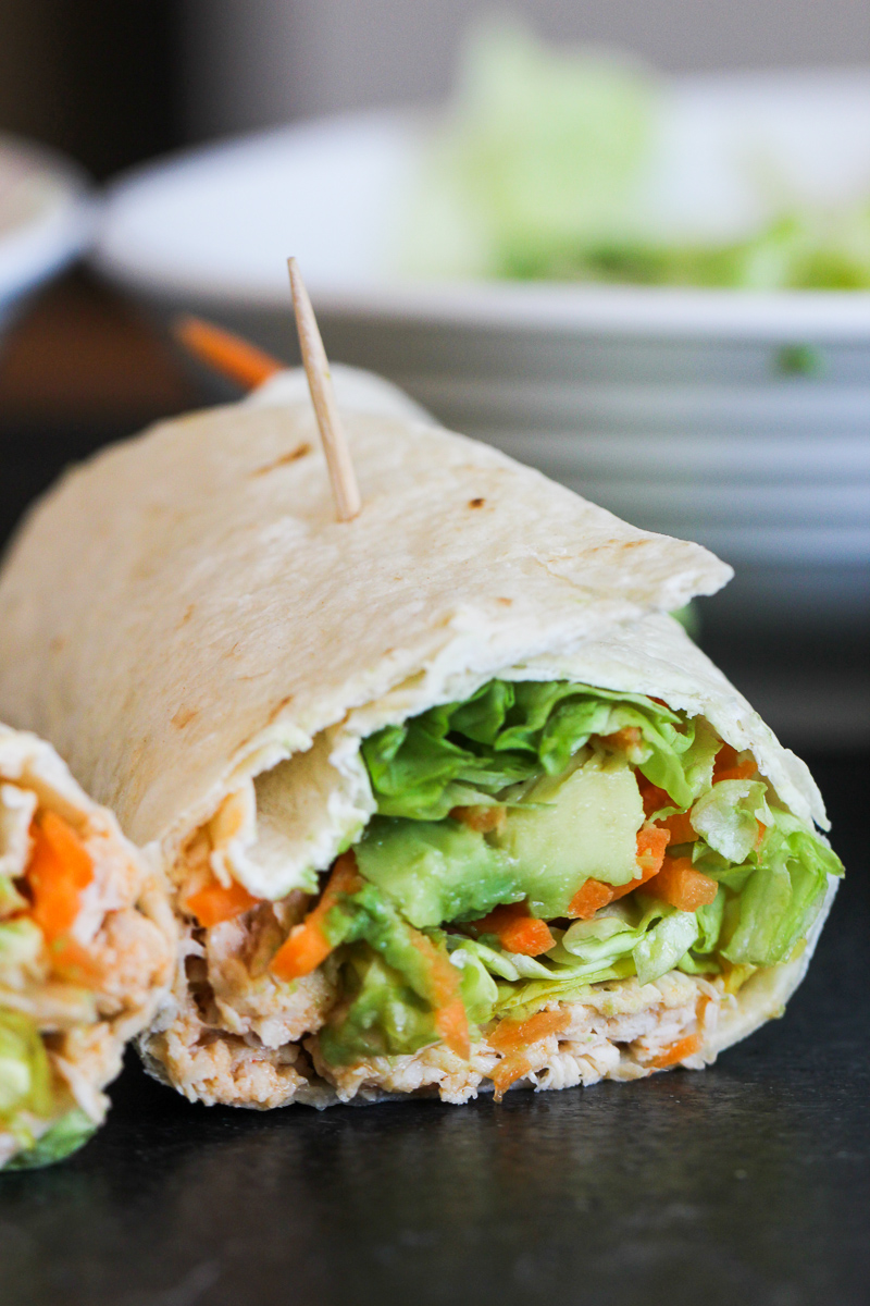 Instant Pot Buffalo Chicken Wraps cut in half with a toothpick