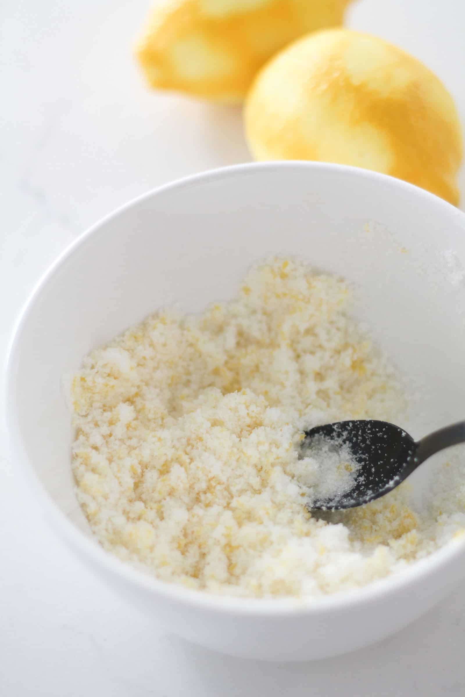 Lemon zest and sugar in a mixing bowl