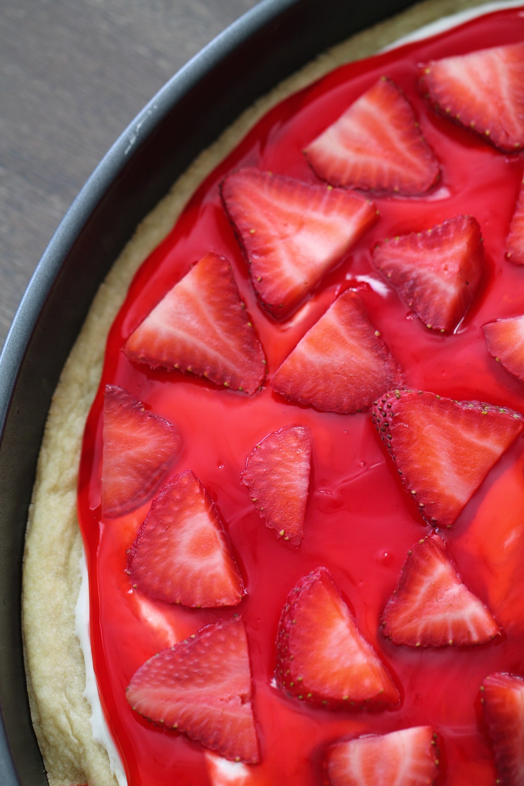 Strawberry layer added to pan