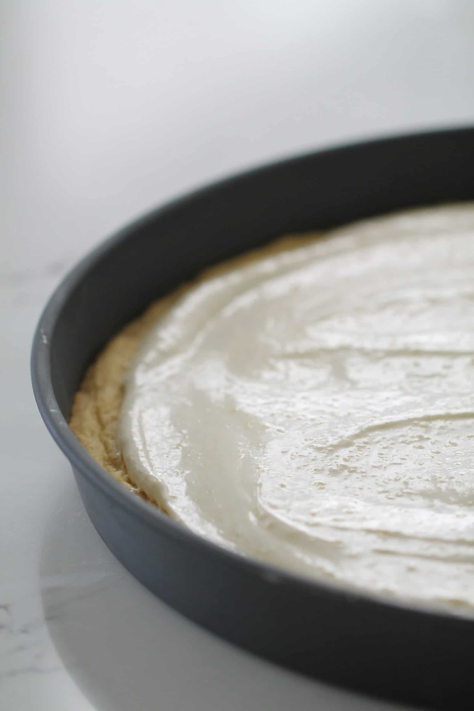 Creamy layer on top of crust in pan