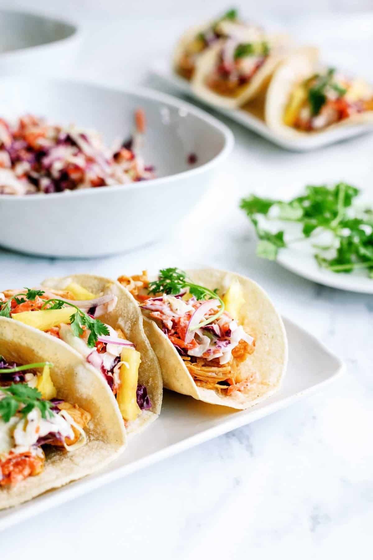 hawaiian bbq chicken tacos on a plate