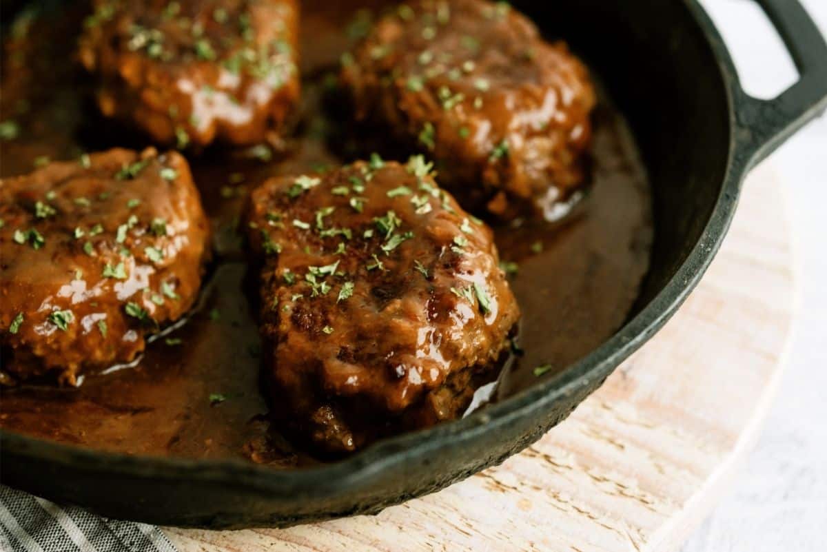 Salisbury Steak patties in a frying pan