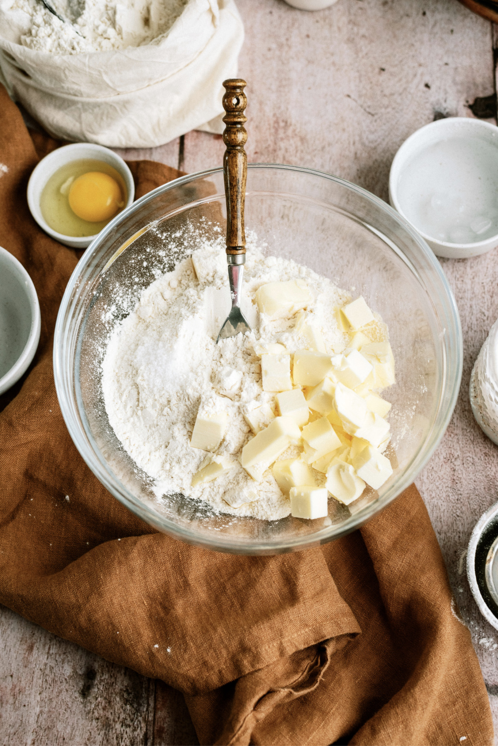 flour and butter together in a bowl to make a pie crust