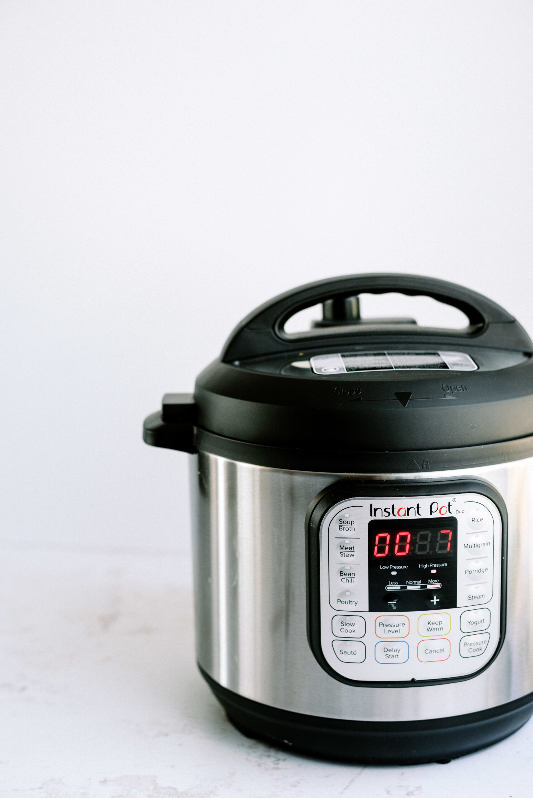 instant pot with food inside set for 7 minutes