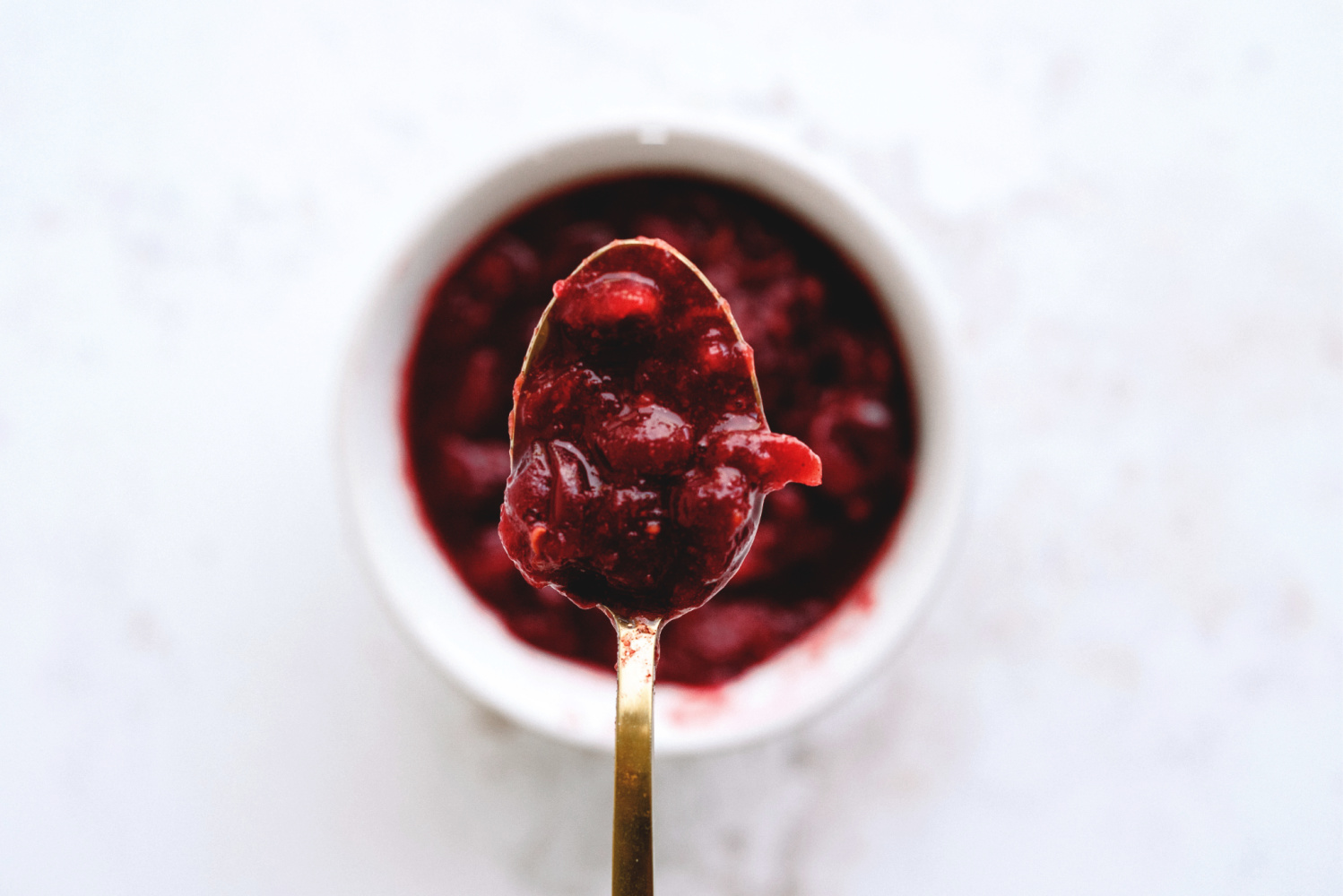 Cranberry sauce in a spoon up close
