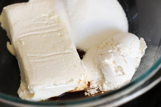 Cream cheese and sugar in mixing bowl